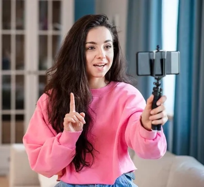 Content creator recording live video stream on a mobile phone